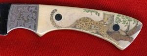 Closeup of Leopard Color Scrimshaw on Ivory Hunter (click to enlarge)